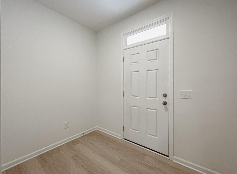 Spacious, unfurnished interior of a new home in East Main Townes, Spartanburg (Image 11).