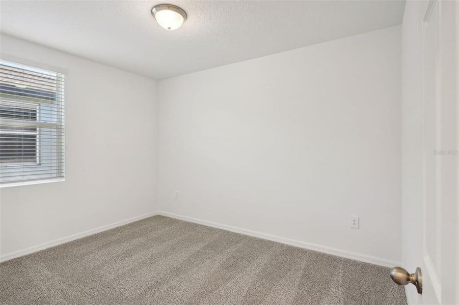 Spacious, unfurnished interior of a new home in Lake Deer Estates - Signature Series, Poinciana (Image 33). Spacious, unfurnished interior of a new home in Lake Deer Estates - Signature Series, Poinciana (Image 33).