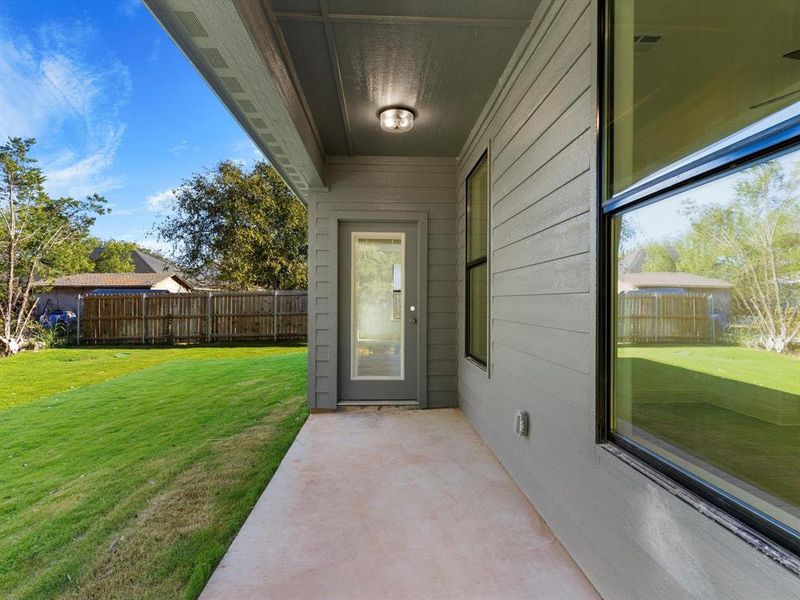 Exterior details and patio area of a home in , Granbury (Image 25).