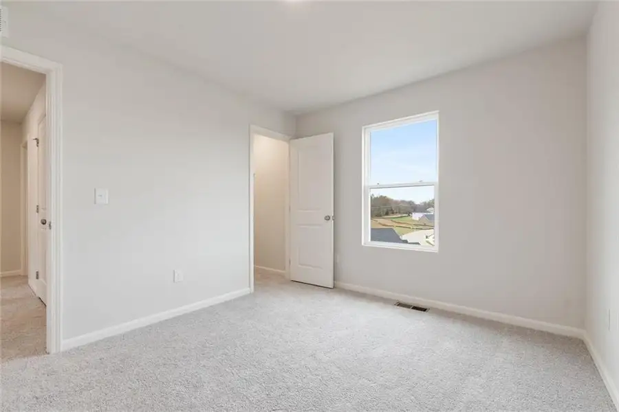 Spacious, unfurnished interior of a new home in Liberty Pointe, Villa Rica (Image 17).