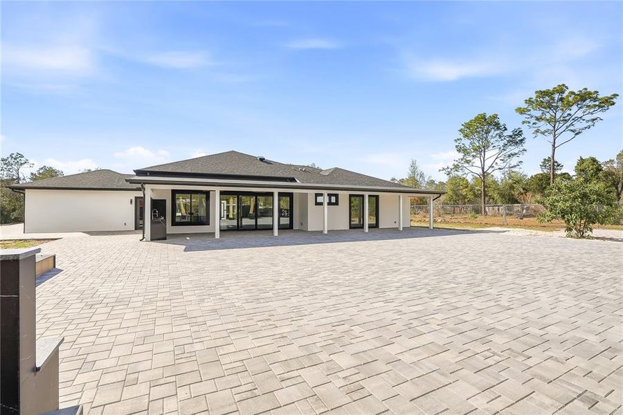 Exterior details and patio area of a home in , Spring Hill (Image 25).