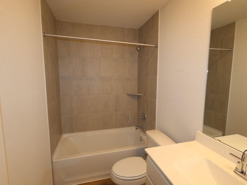 Furnished interior view inside a new home in Wildrye, Waller (Image 11).