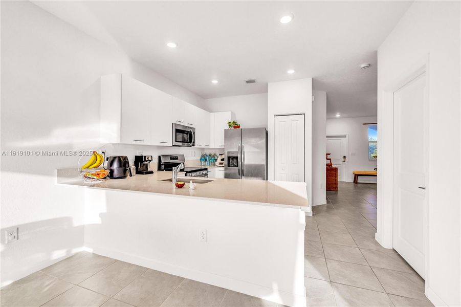 Furnished interior view inside a new home in Westview: Nantucket Collection, Miami (Image 7). Furnished interior view inside a new home in Westview: Nantucket Collection, Miami (Image 7).