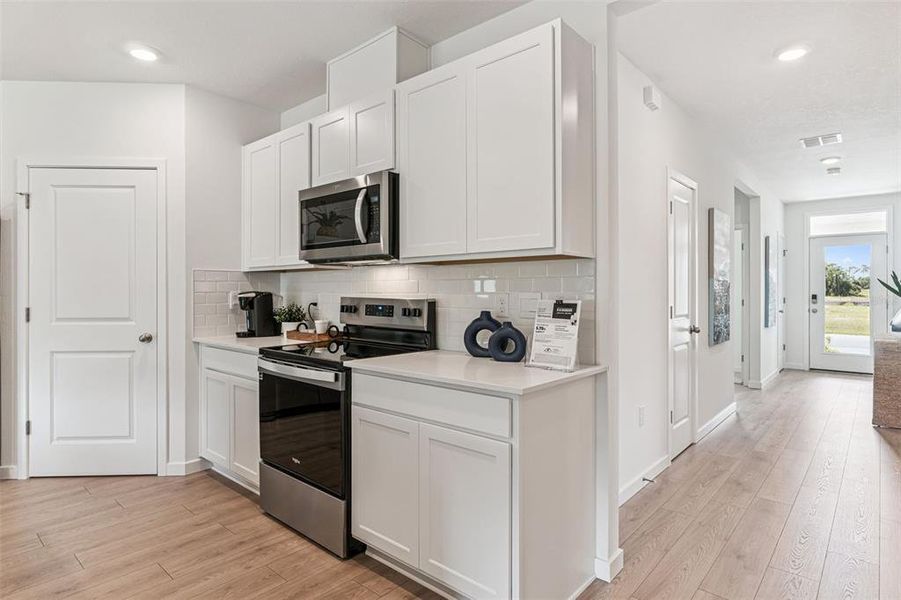 Furnished interior view inside a new home in Crossroads at Kelly Park, Apopka (Image 11).