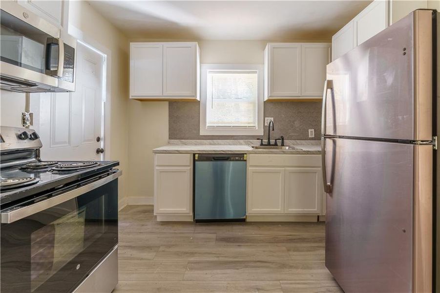 Furnished interior view inside a new home in , Atlanta (Image 6).
