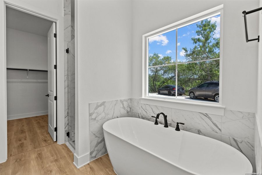 Furnished interior view inside a new home in , Devine (Image 10).