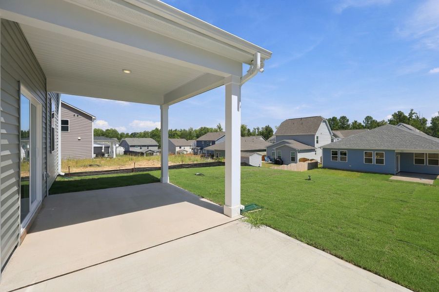 Exterior details and patio area of a home in Neill's Pointe, Angier (Image 19).