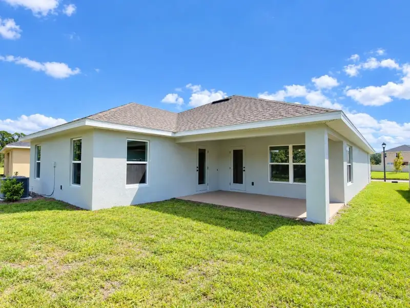 Exterior details and patio area of a home in Harmony Central, Harmony (Image 3).