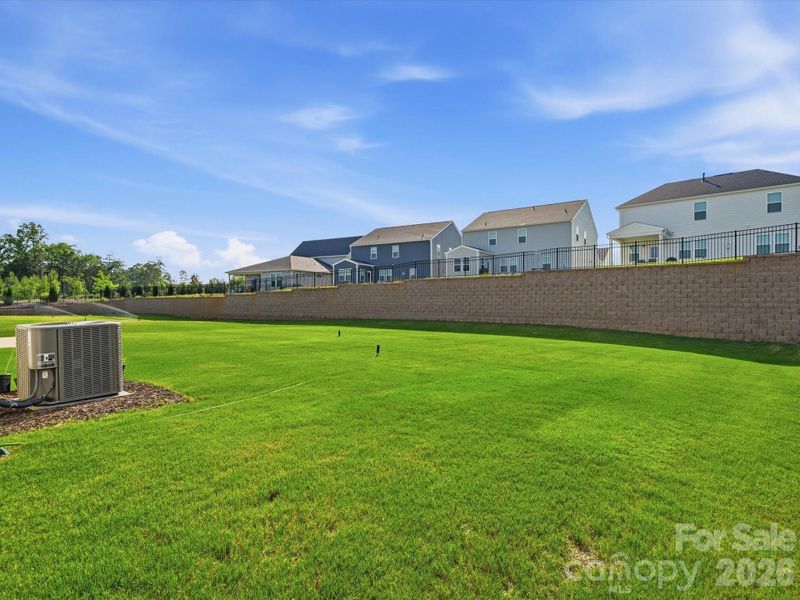 Exterior details and patio area of a home in Parkside Crossing, Charlotte (Image 25). Exterior details and patio area of a home in Parkside Crossing, Charlotte (Image 25).