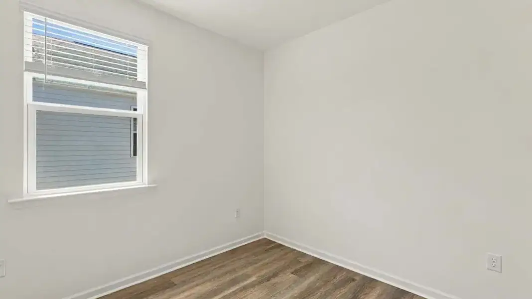 Spacious, unfurnished interior of a new home in The Lakes at North Glynn, Brunswick (Image 21).