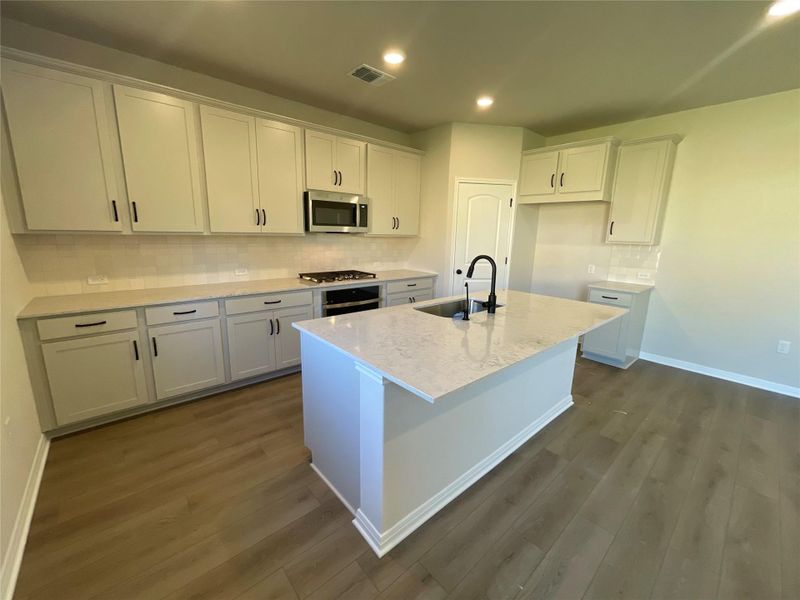 Furnished interior view inside a new home in Covered Bridge, Hutto (Image 9). Furnished interior view inside a new home in Covered Bridge, Hutto (Image 9).