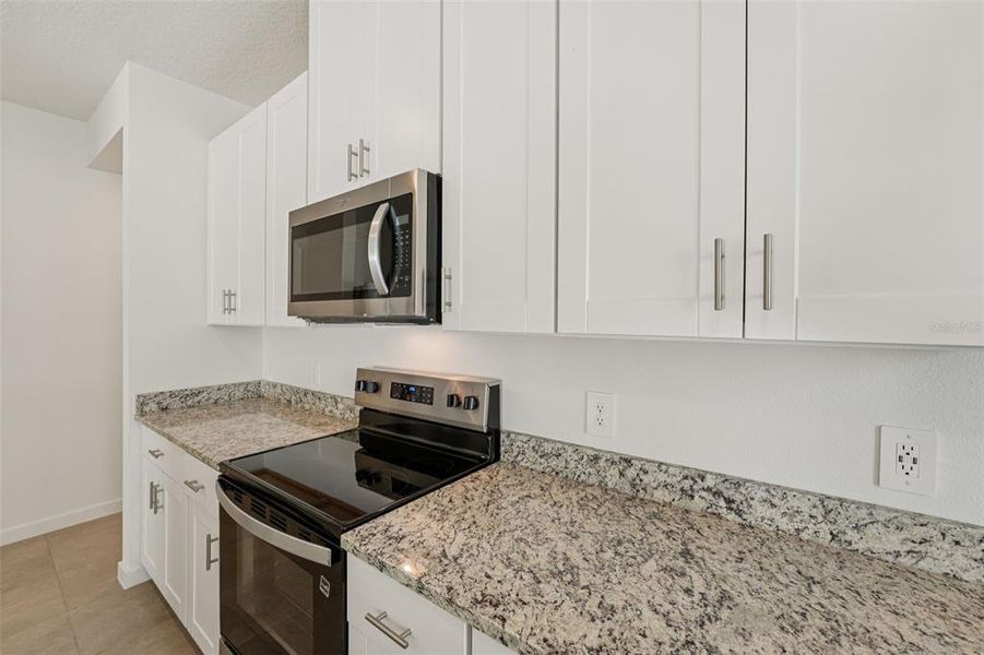 Furnished interior view inside a new home in Flagler Village - Classic Series, Palm Coast (Image 15).