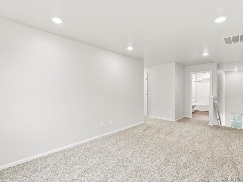 Spacious, unfurnished interior of a new home in Buffalo Highlands: The Flora Collection, Commerce City (Image 19).