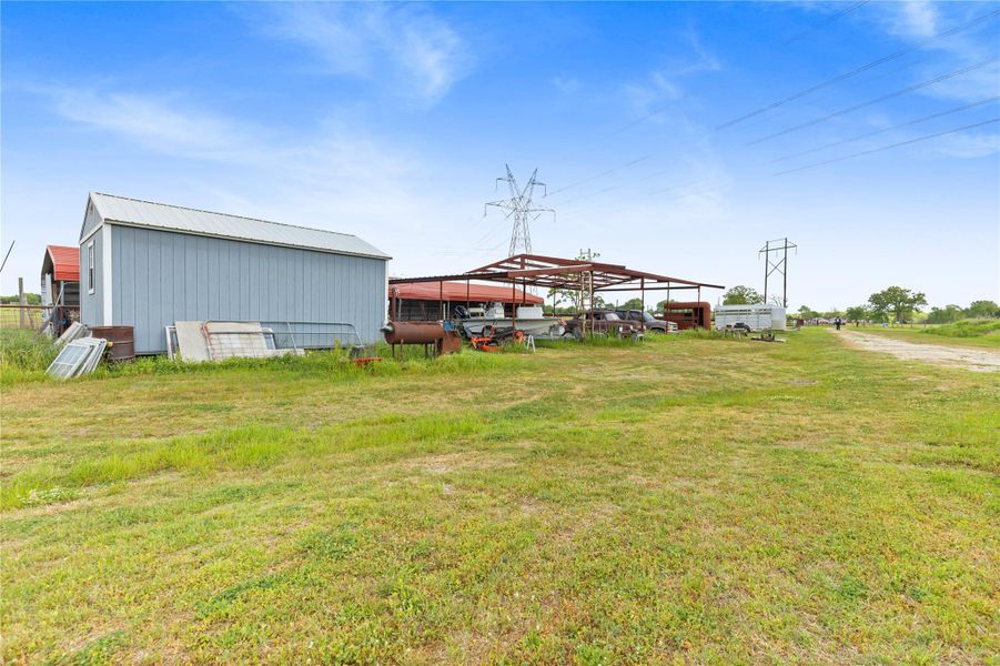 Exterior details and patio area of a home in , Iola (Image 11).