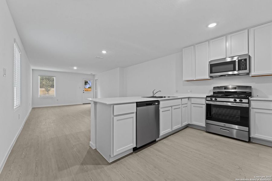 Furnished interior view inside a new home in Torian Village: Belmar Collection, San Antonio (Image 3). Furnished interior view inside a new home in Torian Village: Belmar Collection, San Antonio (Image 3).