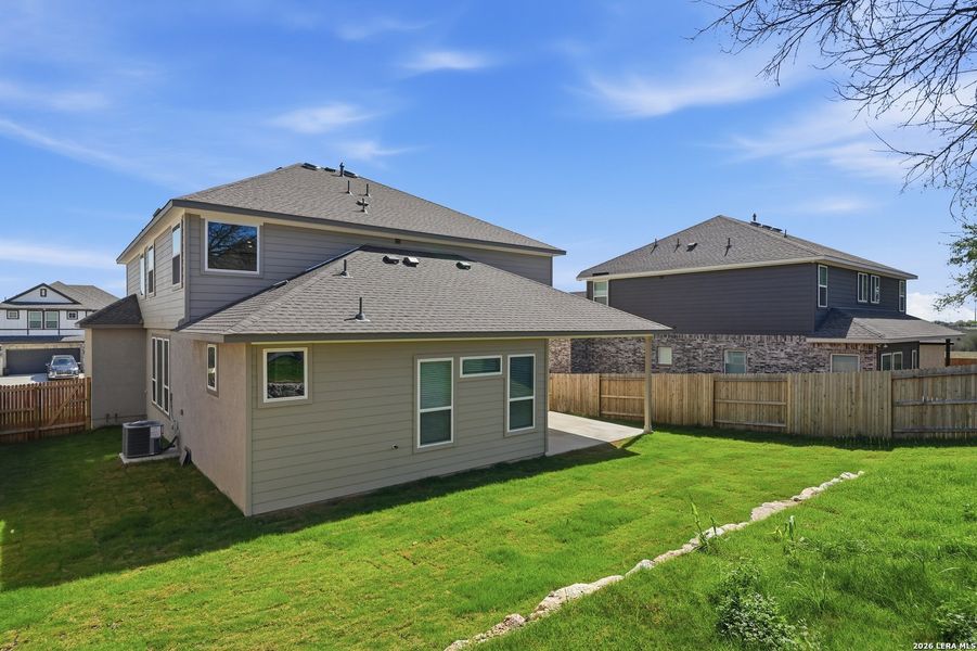 Exterior details and patio area of a home in Buffalo Crossing, Cibolo (Image 25).