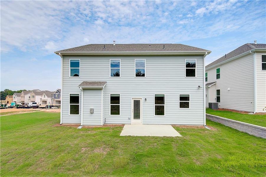 Front exterior of a new home in Abbotts Crossing, Conyers, GA, highlighting curb appeal (Image 16). Front exterior of a new home in Abbotts Crossing, Conyers, GA, highlighting curb appeal (Image 16).