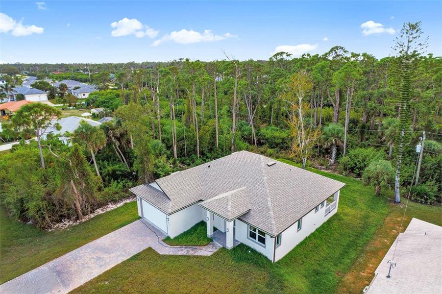 Front exterior of a new home in , Port Charlotte, FL, highlighting curb appeal (Image 26). Front exterior of a new home in , Port Charlotte, FL, highlighting curb appeal (Image 26).