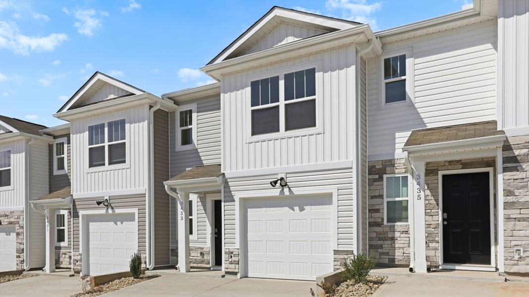 Front exterior of a new home in Baxter Village, Boiling Springs, SC, highlighting curb appeal (Image 2). Front exterior of a new home in Baxter Village, Boiling Springs, SC, highlighting curb appeal (Image 2).