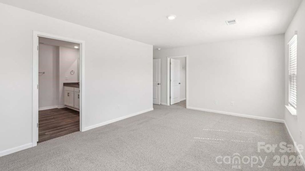 Spacious, unfurnished interior of a new home in Wallace Springs, Statesville (Image 32).