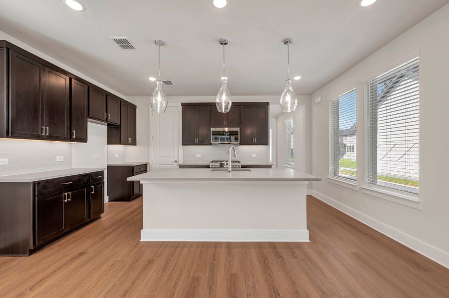 Furnished interior view inside a new home in Union Park, Little Elm (Image 7). Furnished interior view inside a new home in Union Park, Little Elm (Image 7).