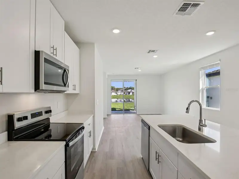 Furnished interior view inside a new home in Leyland Preserve - Premier Series, Brooksville (Image 5). Furnished interior view inside a new home in Leyland Preserve - Premier Series, Brooksville (Image 5).