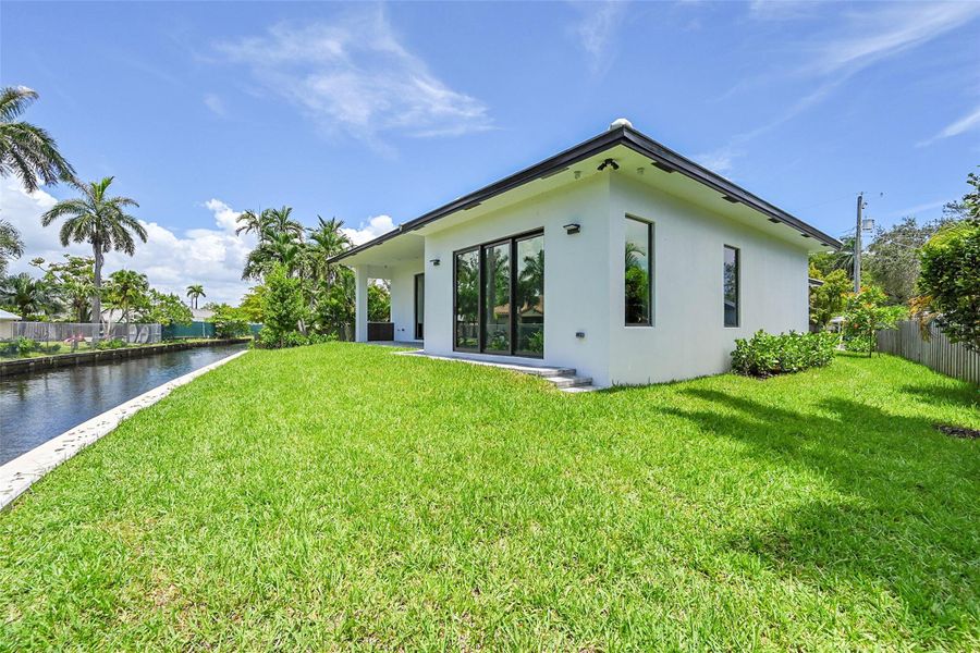Front exterior of a new home in , Wilton Manors, FL, highlighting curb appeal (Image 1).