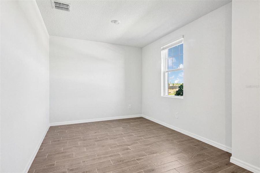 Spacious, unfurnished interior of a new home in Two Rivers - Classic Series, Zephyrhills (Image 14).