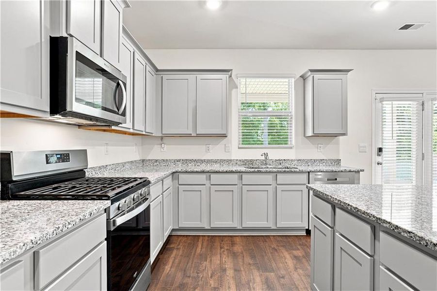 Furnished interior view inside a new home in The Enclave at Flat Rock Hills, Stonecrest (Image 12).