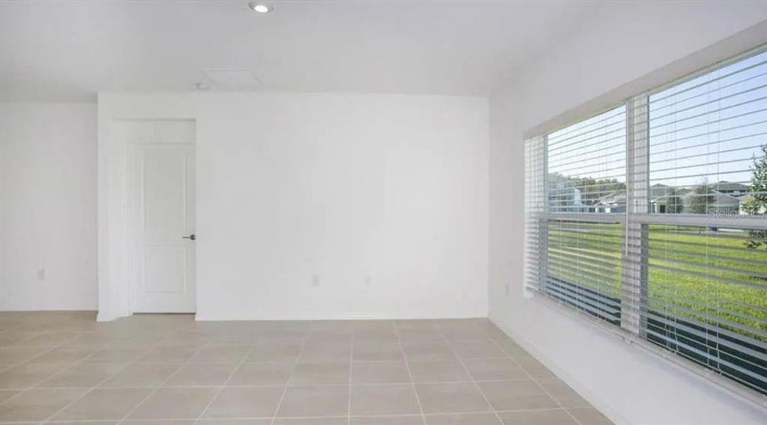 Spacious, unfurnished interior of a new home in Firethorn, Parrish (Image 13).