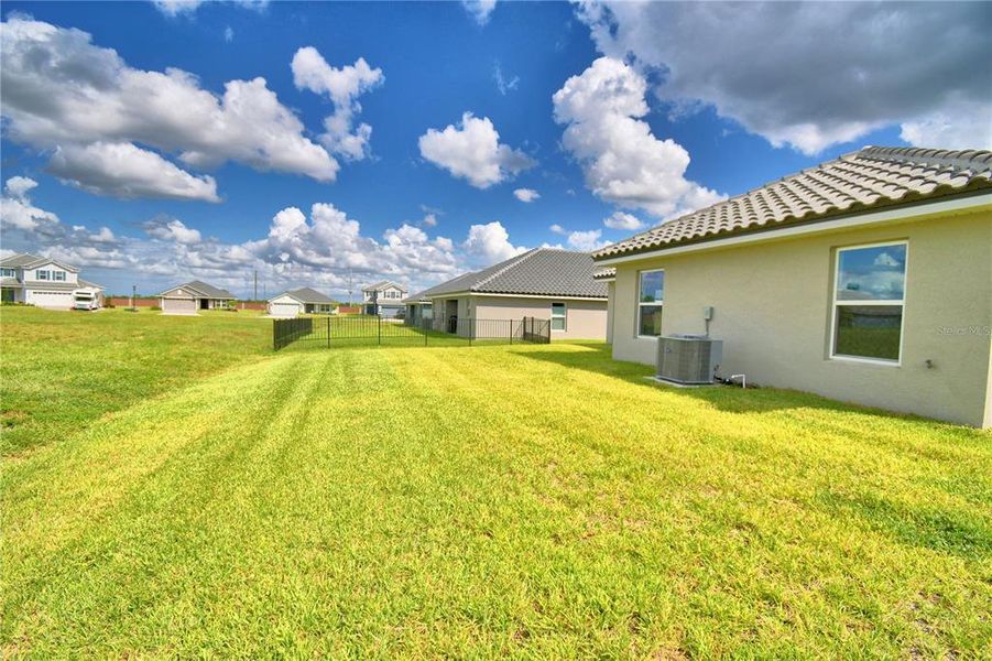 Exterior details and patio area of a home in , Auburndale (Image 32). Exterior details and patio area of a home in , Auburndale (Image 32).