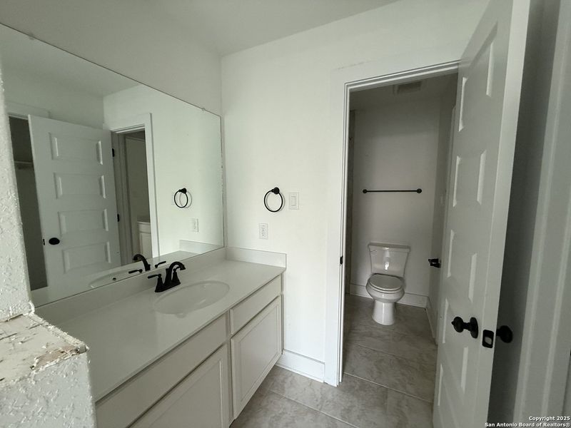 Furnished interior view inside a new home in Buffalo Crossing – New Phase Now Preselling, Cibolo (Image 9).