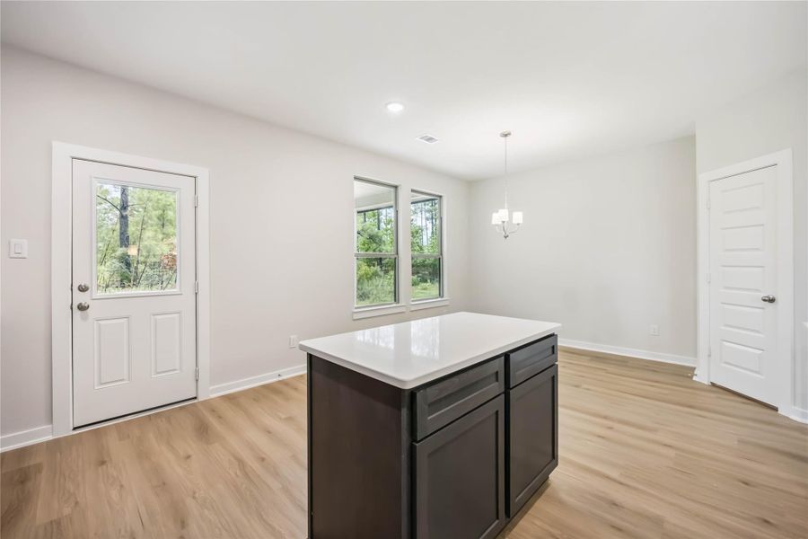 Furnished interior view inside a new home in Deer Pines, Conroe (Image 10).