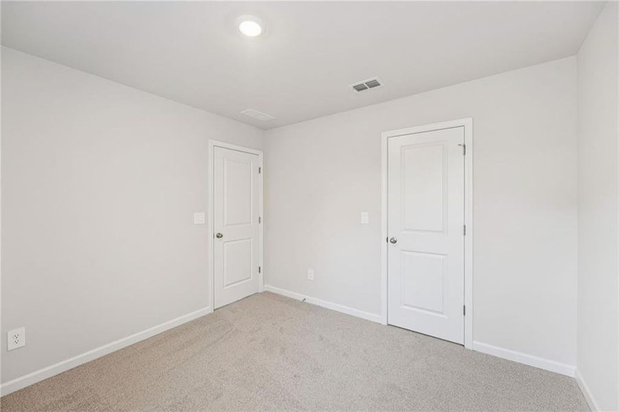 Spacious, unfurnished interior of a new home in Creekside at Oxford Park, Fairburn (Image 33).