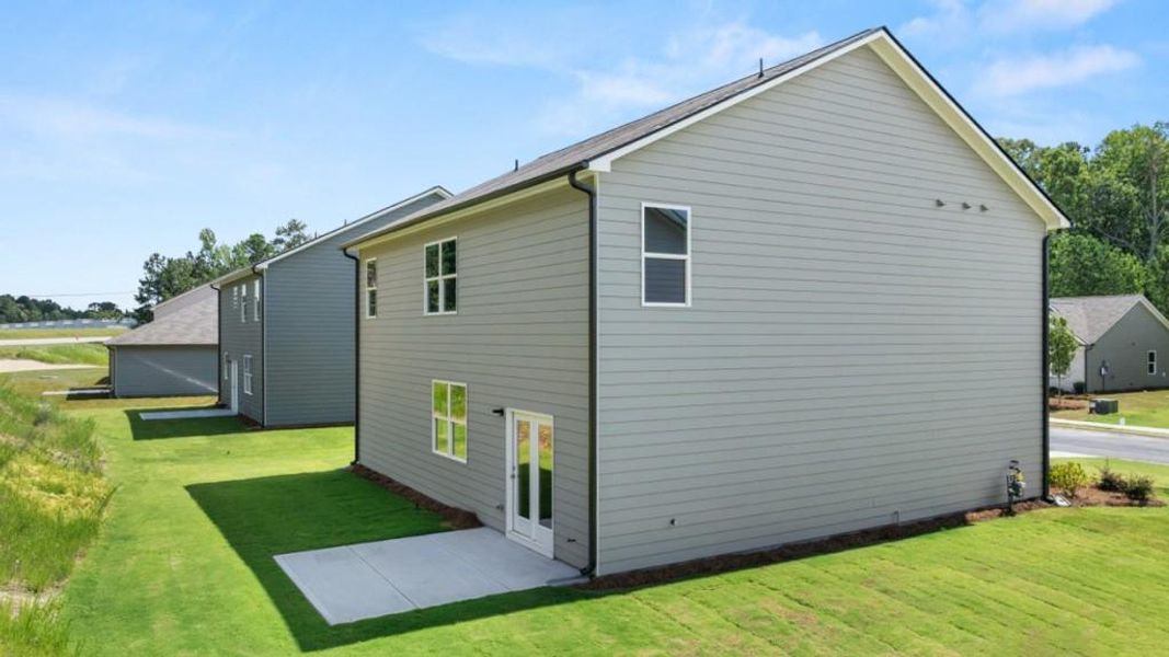 Front exterior of a new home in Northwoods at Mirror Lake, Villa Rica, GA, highlighting curb appeal (Image 19).