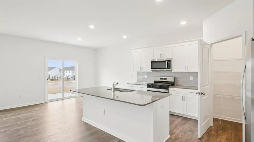 Furnished interior view inside a new home in The Reserve at Prestleigh, Wake Forest (Image 4). Furnished interior view inside a new home in The Reserve at Prestleigh, Wake Forest (Image 4).