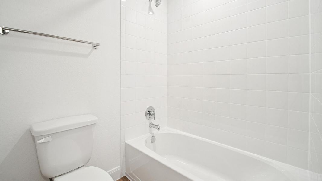 Furnished interior view inside a new home in Railhead, Cedar Creek (Image 6).