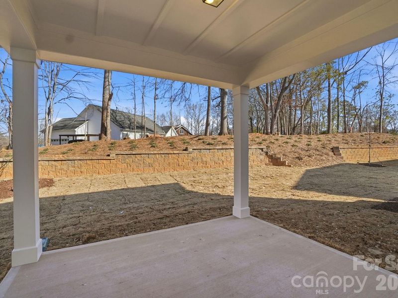 Exterior details and patio area of a home in Enclave at Belmont, Belmont (Image 3).