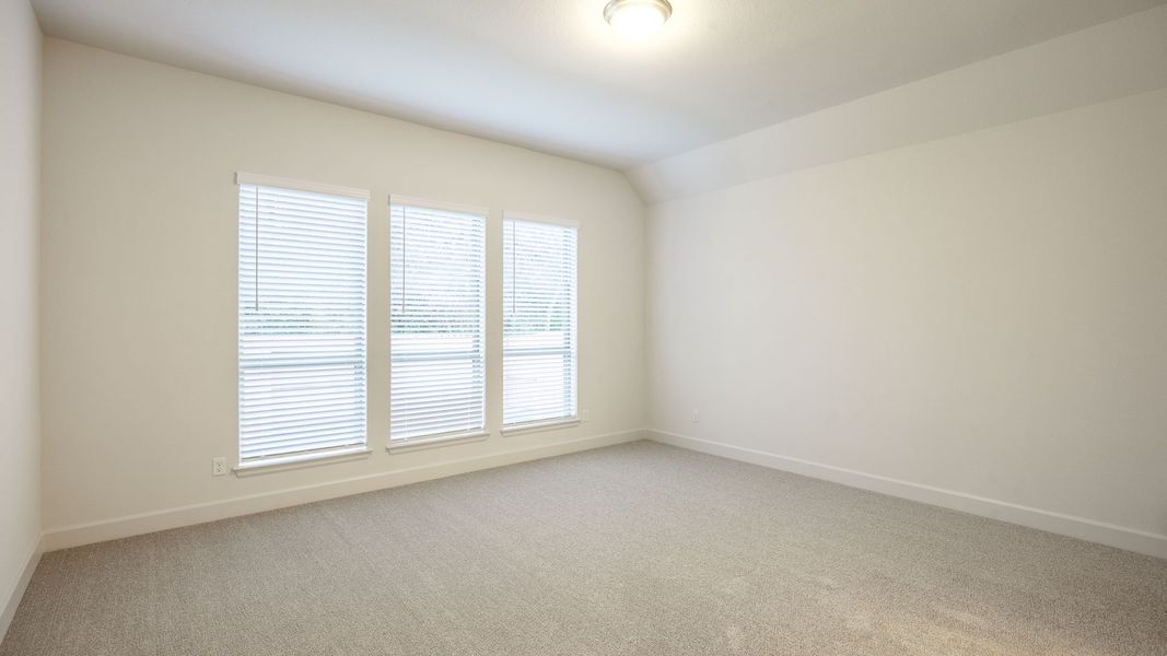 Spacious, unfurnished interior of a new home in The Colony, Bastrop (Image 19).