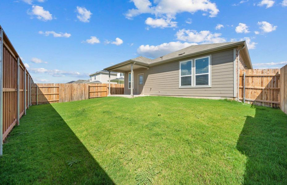 Exterior details and patio area of a home in Sunfield, Buda (Image 3). Exterior details and patio area of a home in Sunfield, Buda (Image 3).