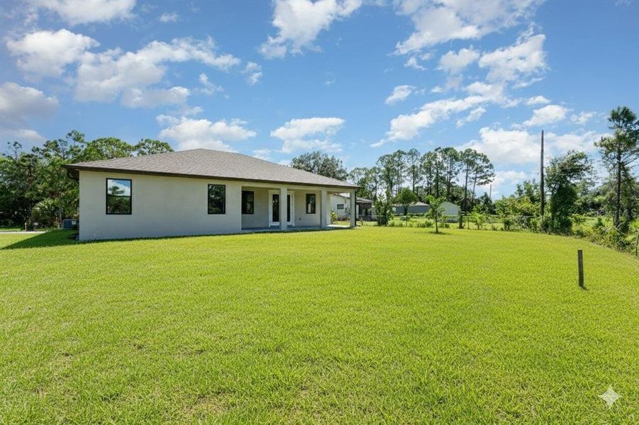 Exterior details and patio area of a home in , Palm Bay (Image 30). Exterior details and patio area of a home in , Palm Bay (Image 30).