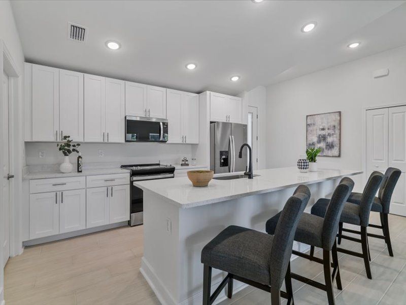 Representative furnished interior of a home built from the The Paradise Cove II by Sunlife Homes LLC in Cape Coral, Cape Coral (Image 10).