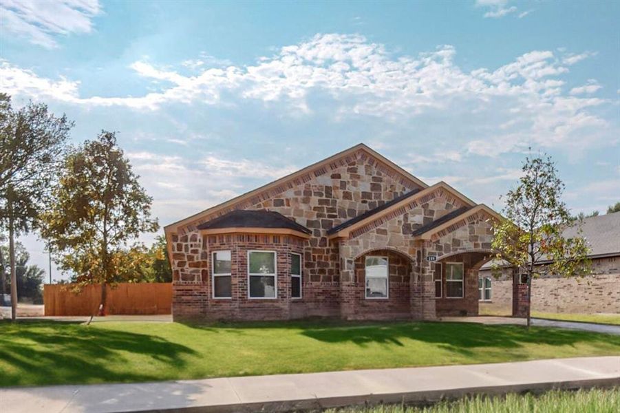 Added driveway and side entry garage