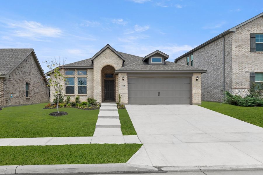 Front exterior of a new home in De Berry Reserve, Royse City, TX, highlighting curb appeal (Image 1). Front exterior of a new home in De Berry Reserve, Royse City, TX, highlighting curb appeal (Image 1).