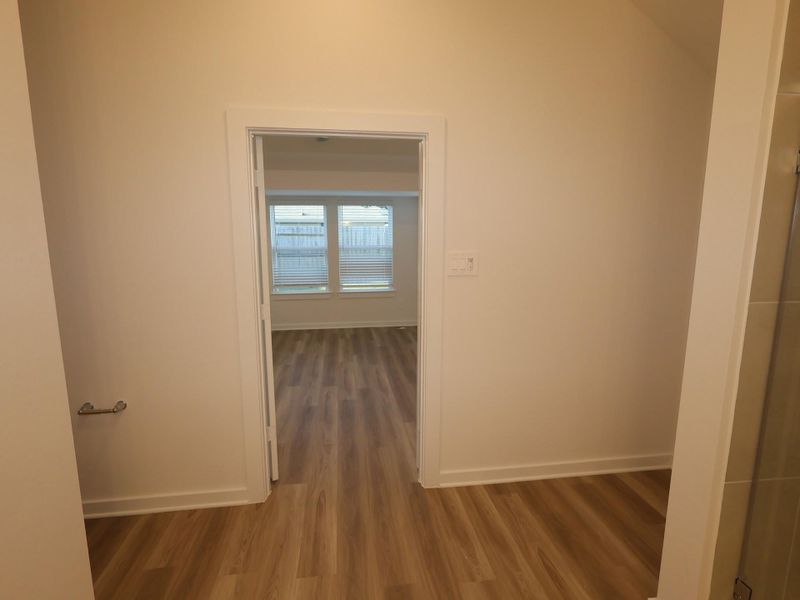 Spacious, unfurnished interior of a new home in Pinewood at Grand Texas, New Caney (Image 33).