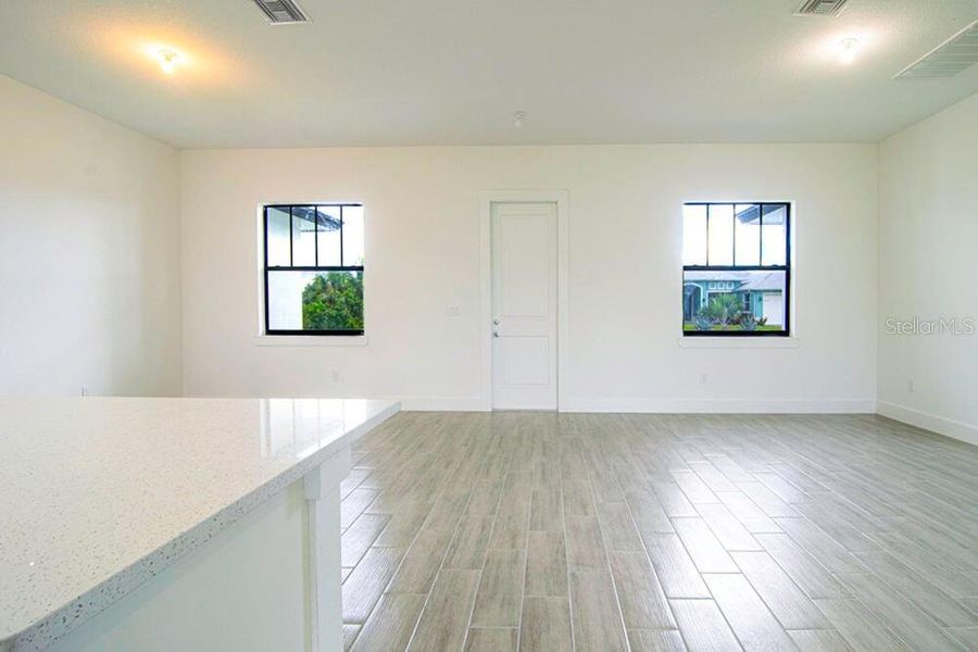 Spacious, unfurnished interior of a new home in , Port Charlotte (Image 10).