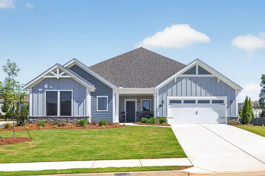 Front exterior of a new home in , Dacula, GA, highlighting curb appeal (Image 1). Front exterior of a new home in , Dacula, GA, highlighting curb appeal (Image 1).