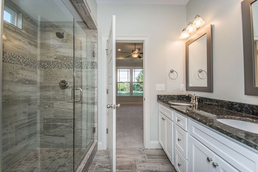 Representative furnished interior of a home built from the Mediterranean by Enchanted Homes in Messer Farms, Inman (Image 17).