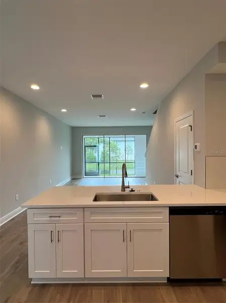 Furnished interior view inside a new home in The Towns At Long Bayou, Seminole (Image 7).
