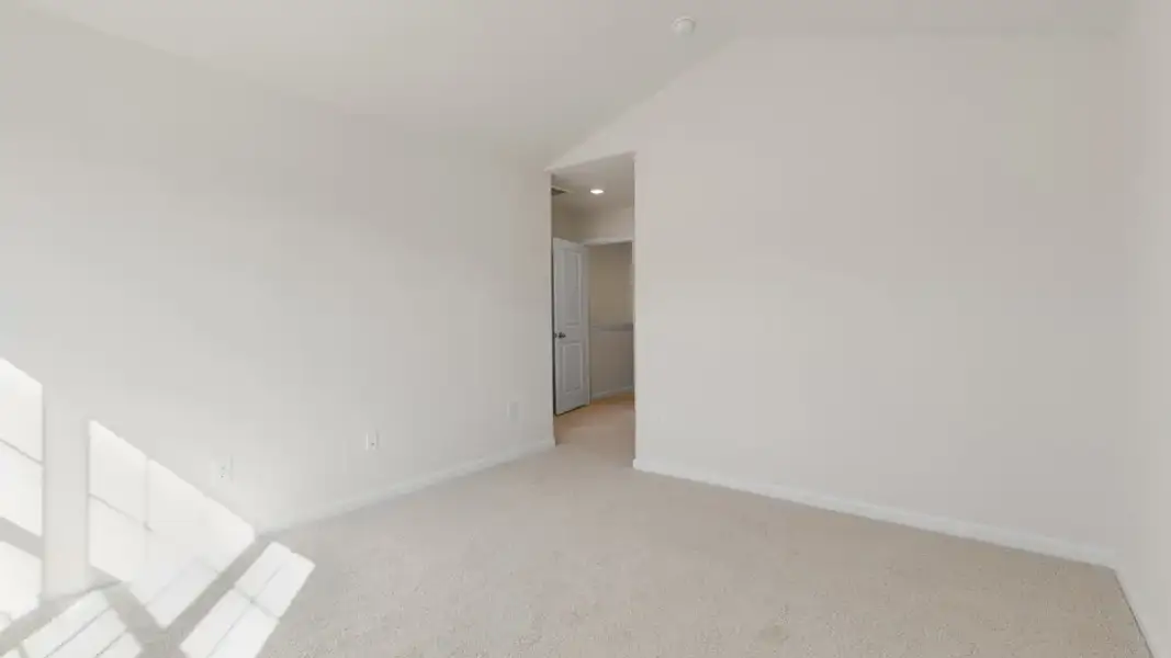 Spacious, unfurnished interior of a new home in The Townes at Galvins Ridge, Sanford (Image 22).